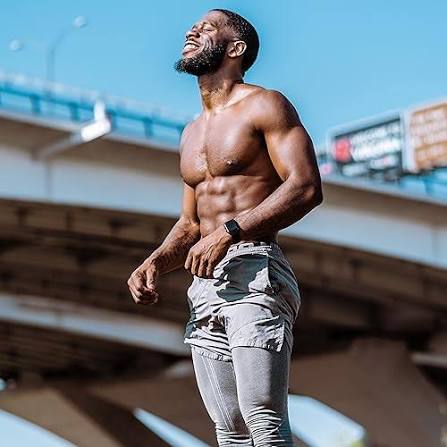 Trell — fitness lifestyle, shirtless under bridge, athletic build